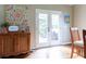 Dining area with hardwood floors that has access to the back deck through French doors at 19 Autumn Ne Pl, White, GA 30184