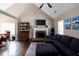 Cozy living room featuring a fireplace, plush seating, and an open concept layout at 19 Autumn Ne Pl, White, GA 30184