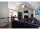 Spacious living room featuring vaulted ceilings, a fireplace, and an open floor plan at 19 Autumn Ne Pl, White, GA 30184