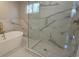 Spa-like bathroom with a freestanding tub, marble tiled walk-in shower, and stylish fixtures at 2085 Dellwood, Decatur, GA 30032