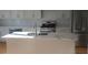Modern kitchen featuring an island, stainless steel appliances, and white cabinetry at 2085 Dellwood, Decatur, GA 30032