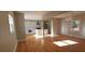 Bright, open-concept living room with hardwood floors and recessed lighting, connected to a modern kitchen at 2085 Dellwood, Decatur, GA 30032