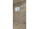 Modern bathroom featuring a glass-enclosed shower with decorative marble-look tile at 2085 Dellwood, Decatur, GA 30032