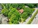 Aerial view of the property, displaying its location with mature trees, close proximity to nearby roads and amenities at 27 S Avondale Rd, Avondale Estates, GA 30002