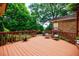Outdoor deck with chairs overlooking a private backyard at 27 S Avondale Rd, Avondale Estates, GA 30002