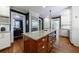 Spacious kitchen featuring an island with granite countertops and stainless steel appliances at 27 S Avondale Rd, Avondale Estates, GA 30002