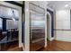 Sleek kitchen featuring stainless steel refrigerator and elegant white cabinets at 27 S Avondale Rd, Avondale Estates, GA 30002