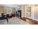Inviting living room with a fireplace, hardwood floors, and natural light at 27 S Avondale Rd, Avondale Estates, GA 30002