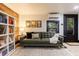 Living room features a comfortable couch, stylish decor, and an exterior door to the deck at 27 S Avondale Rd, Avondale Estates, GA 30002