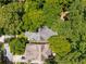 Bird's-eye view of the property, highlighting the roof and the tree-lined streets of the neighborhood at 626 Elmwood Ne Dr, Atlanta, GA 30306