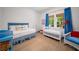 Cozy bedroom featuring a crib, comfortable bed and lots of natural light at 626 Elmwood Ne Dr, Atlanta, GA 30306