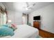 Bright bedroom with built-in shelves, hardwood floors and ceiling fan at 626 Elmwood Ne Dr, Atlanta, GA 30306