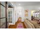 Bright living room featuring hardwood floors and a view into the dining area at 626 Elmwood Ne Dr, Atlanta, GA 30306