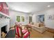 Cozy living room features a fireplace, windows, and comfortable seating at 626 Elmwood Ne Dr, Atlanta, GA 30306