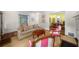 Spacious living room with neutral-toned furniture and doorways leading to other rooms at 626 Elmwood Ne Dr, Atlanta, GA 30306