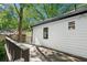 Exterior view shows house siding and a wooden back deck at 1556 Braeburn Se Dr, Atlanta, GA 30316