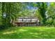 Expansive backyard with a spacious deck, perfect for outdoor entertaining and relaxing at 1556 Braeburn Se Dr, Atlanta, GA 30316