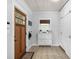 Bright entryway features custom built-in cabinets and a stylish shoe bench at 1556 Braeburn Se Dr, Atlanta, GA 30316