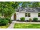 Home's entrance with a well-maintained lawn and inviting facade at 1556 Braeburn Se Dr, Atlanta, GA 30316