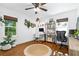 Home office with two desks, hardwood floors, two windows, and lots of natural light at 1556 Braeburn Se Dr, Atlanta, GA 30316
