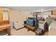 Finished basement features a large seating area with a television and a vintage wood hutch at 200 Zachary Woods Nw Pt, Marietta, GA 30064