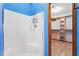 Walk-in shower with open walk-in closet featuring built-in shelving at 200 Zachary Woods Nw Pt, Marietta, GA 30064