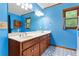 Bright bathroom featuring a double vanity, geometric patterned flooring, and warm wood trim at 200 Zachary Woods Nw Pt, Marietta, GA 30064