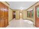 Sunlit dining room with tile floors, wood trim, and a door to the outside at 200 Zachary Woods Nw Pt, Marietta, GA 30064