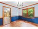 Dining room boasts beautiful hardwood floors and windows with a view of the outdoors at 200 Zachary Woods Nw Pt, Marietta, GA 30064