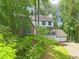 Charming two-story home with a 2-car garage surrounded by mature trees at 200 Zachary Woods Nw Pt, Marietta, GA 30064