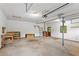 Two car garage with work bench and storage shelving at 200 Zachary Woods Nw Pt, Marietta, GA 30064