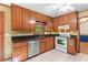 This kitchen showcases granite countertops and stainless steel dishwasher at 200 Zachary Woods Nw Pt, Marietta, GA 30064