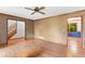Open living room featuring wood floors and a staircase leading to the upper level at 200 Zachary Woods Nw Pt, Marietta, GA 30064