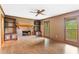 The living room has a brick fireplace with built-in shelving on each side and hardwood flooring at 200 Zachary Woods Nw Pt, Marietta, GA 30064