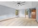 Large primary bedroom with a tray ceiling, hardwood trim and a private ensuite bathroom at 200 Zachary Woods Nw Pt, Marietta, GA 30064