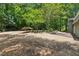 Spacious backyard with mature trees, perfect for outdoor activities at 285 Glen Lake Dr, Atlanta, GA 30327