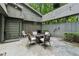 Charming backyard patio with comfortable seating and ambient string lights at 285 Glen Lake Dr, Atlanta, GA 30327