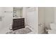 Bathroom with a modern dark wood vanity and tiled floors at 285 Glen Lake Dr, Atlanta, GA 30327