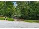 Secluded home with lush greenery offering a private retreat and picturesque landscape at 285 Glen Lake Dr, Atlanta, GA 30327