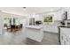 Bright kitchen with white cabinets, stainless steel appliances, and a cozy eating area at 285 Glen Lake Dr, Atlanta, GA 30327