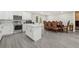 Spacious kitchen with updated appliances, sleek counters, and a breakfast dining table at 285 Glen Lake Dr, Atlanta, GA 30327
