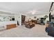 Spacious living area featuring a stone fireplace and comfortable seating at 285 Glen Lake Dr, Atlanta, GA 30327