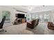 Cozy finished basement featuring a comfortable seating area, entertainment setup, and natural light at 285 Glen Lake Dr, Atlanta, GA 30327