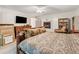 Comfortable main bedroom featuring a fireplace and natural light at 285 Glen Lake Dr, Atlanta, GA 30327