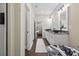Spacious bathroom with double vanity, granite countertops, and access to bedrooms and closet at 338 Mount Zion Rd, Oxford, GA 30054