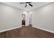 Spacious bedroom featuring dark wood floors and adjacent bathroom at 338 Mount Zion Rd, Oxford, GA 30054