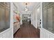 Elegant foyer with hardwood floors and decorative glass front doors at 338 Mount Zion Rd, Oxford, GA 30054