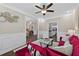 Open living room with a view of the dining area, wainscoting and modern decor at 338 Mount Zion Rd, Oxford, GA 30054