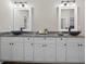 Main bathroom featuring granite countertops, double sinks, and white shaker cabinets at 338 Mount Zion Rd, Oxford, GA 30054