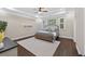 Main bedroom with trey ceiling, hardwood floors, and large windows letting in natural light at 338 Mount Zion Rd, Oxford, GA 30054